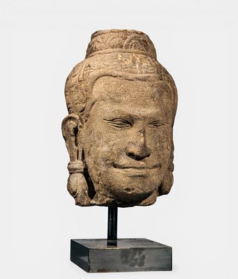 Exceptional Shiva Head, Cambodia. Khmer. Bayon Site. 13th Century. Headdress with a bun and 