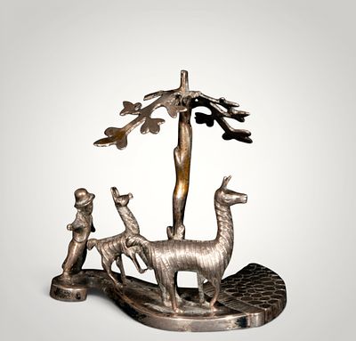 Shepherd with llamas and tree. Peruvian School. 20th Century. Cast, chased, and assembled 800 
