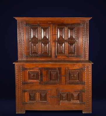 Two-body sideboard in walnut and chestnut. Spanish School. 16th century. Carved walnut and 
