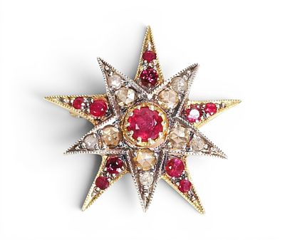 Star-shaped pendant in silver gilt with rubies and rose-cut diamonds. Partially gilded 925 