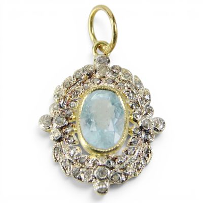 Colgante en plata sobredorada con aguamarina y diamantes talla rosa. Plata de ley 925 