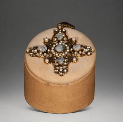 Gilded silver cross with moonstone. Silver-gilt cross with moonstone cabochons, pearls, and 