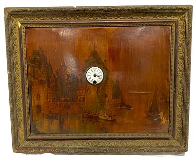Antiguo cuadro autómata con reloj en le centro, plasmado sobre cartón y marco dorado. 63x51x10