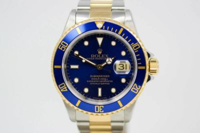 Rolex - Oyster Perpetual Date Submariner Rolex Vintage Wristwatch on Two-Tone Rolex bracelet 