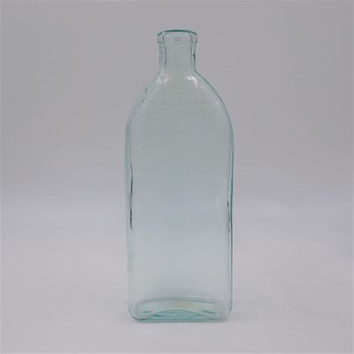 Стеклянная бутылка. Предположительно начало 20 века. Размер: высота 3,5 х 6,5 х 18 см, диаметр 