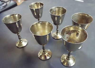 Шесть мельхиоровых рюмок.