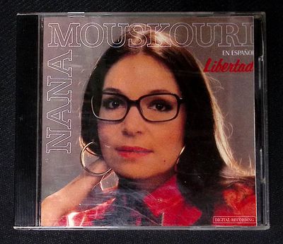 Nana Mouskouri - Libertad. ФРГ. Потертости футляра, диск с минимальными потертостями.