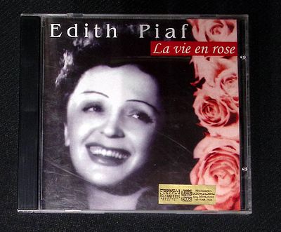 Edith Piaf - La vie en rose. Россия. Потертости футляра, небольшие потертости диска.