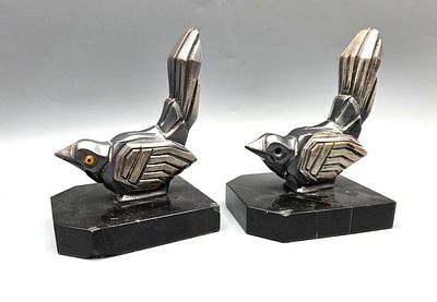 עפ"י איפוליט מורו (Hippolyte Francois Moreau), זוג תומכי ספרים ארט-דקו "ציפורי דרור". עפ"י 