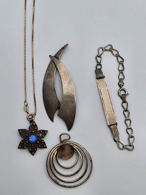 Assortment of 4 Vintage Silver Jewelry Pieces. Assortment of 4 vintage silver jewelry pieces 
