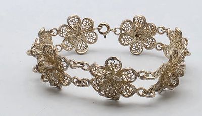 Silver Filigree Link Bracelet. A silver filigree link bracelet, crafted by hand in 