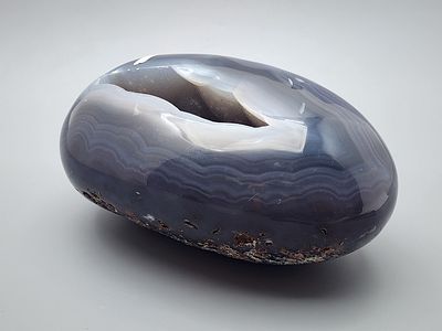 Luxury Agate Geode (Joud) Sculpture — "Egg" Cave Form. A natural, whole agate geode (joud) rock 