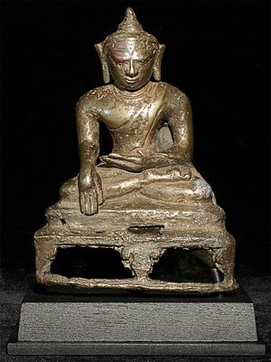 13thC Pagan/Piny Burmese Buddha. This is a rare late Pagan/Pinya bronze Burmese Buddha from the 
