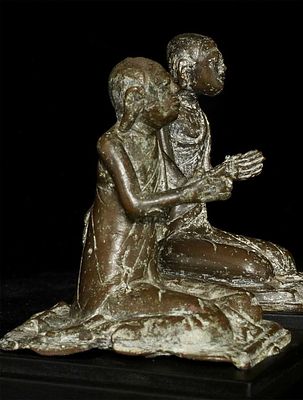 This is a pair of Burmese 18/19thC bronze monks. They are quite unusual in that while they are 