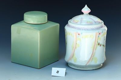 Celadon tea caddy and an antique porcelain biscuit. Celadon tea caddy 6 inches tall 4X4 inches 