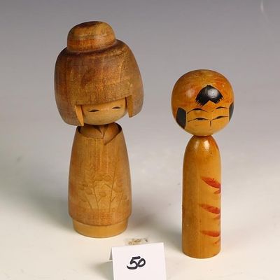 Two vintage Japanese Kokeshi wooden dolls, one is signed Yamaha 6 inches tall, one unsigned 6.5 