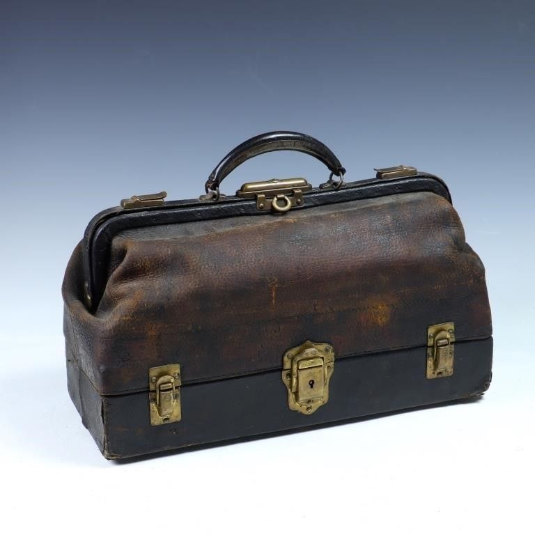 Lot 241: Antique leather medical doctorâ€™s bag with conten