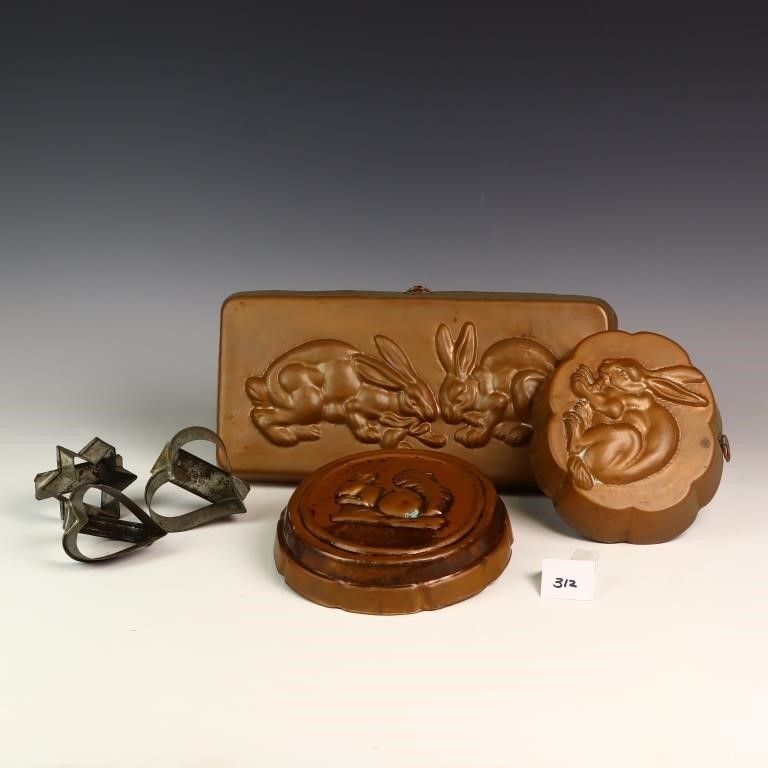 Lot 312: Vintage copper molds and primitive cookie cutters