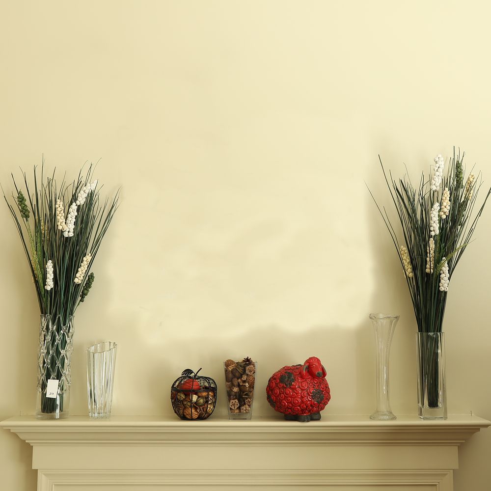 Lot 217: Tall vases with floral arrangement and décor