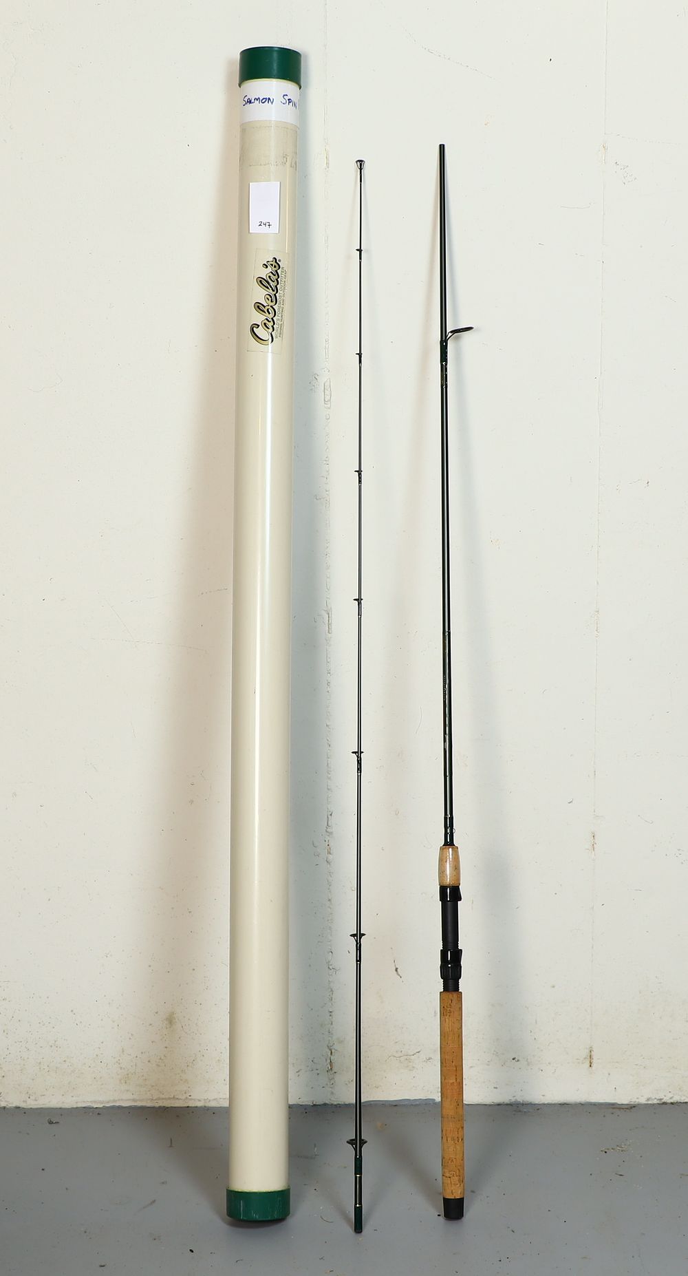 Lot 247: Salmon Steelhead spin rod with Cabela’s tube case