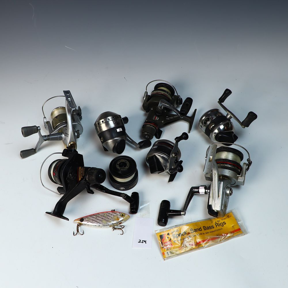 Lot 254: Lot of seven spinning fishing reels
