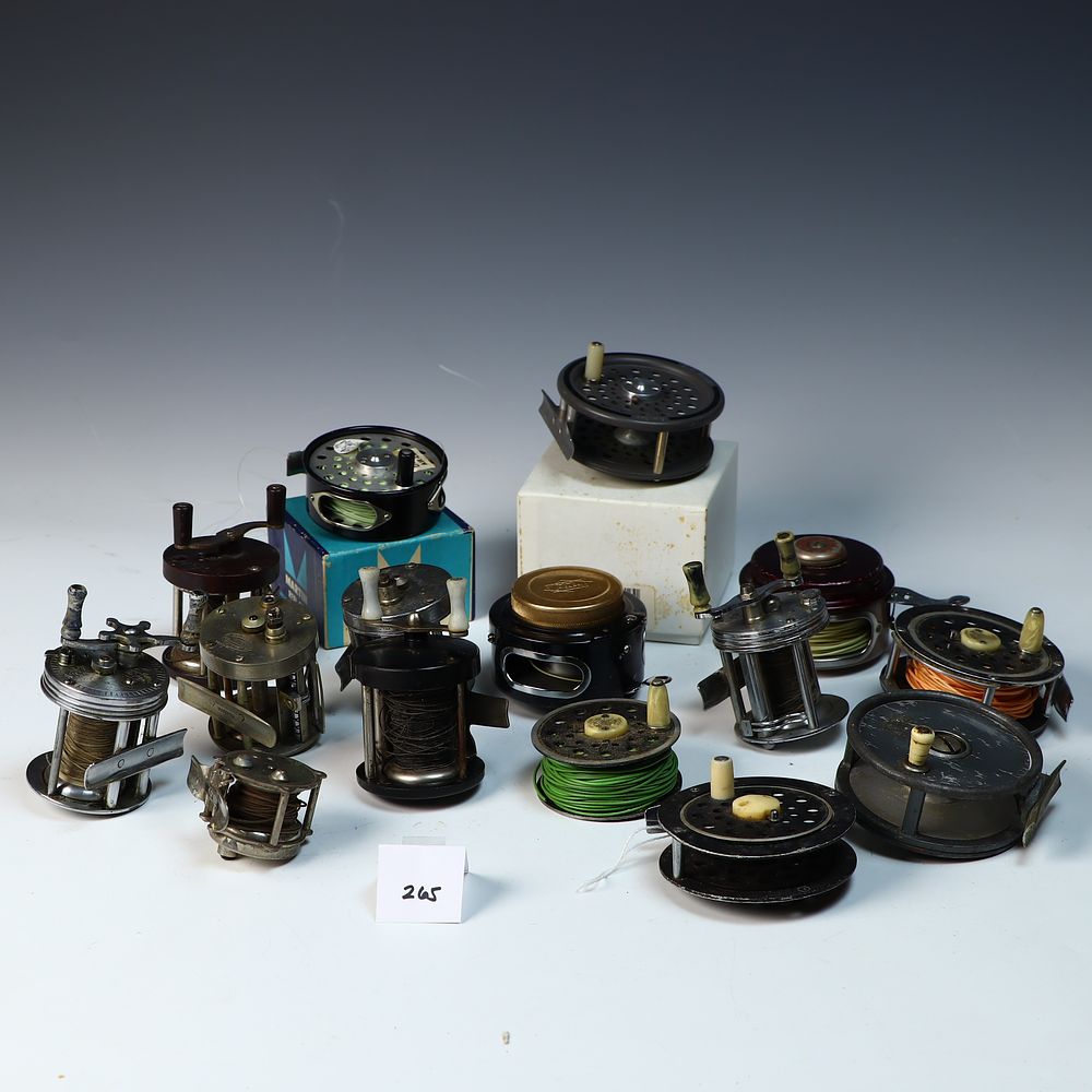 Lot 265: Lot of 13 vintage fishing reels various makers