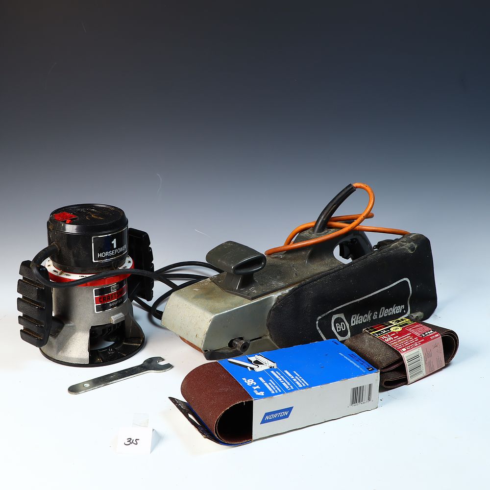 Lot 315: Craftsman 1 Hp router and Black and Decker 2 speed belt sander