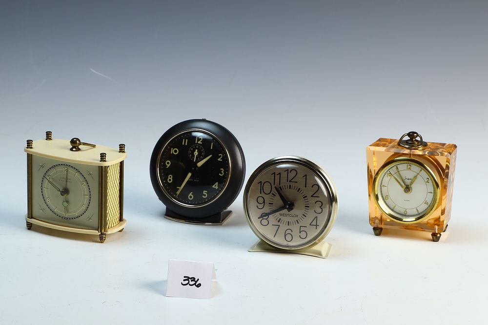 Lot 336: Four vintage travel clocks