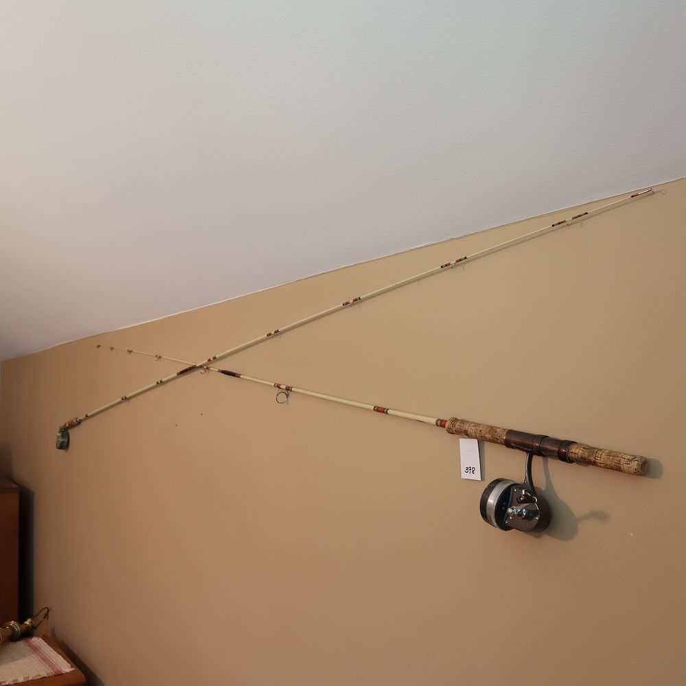 Lot 378: Two vintage fishing rods