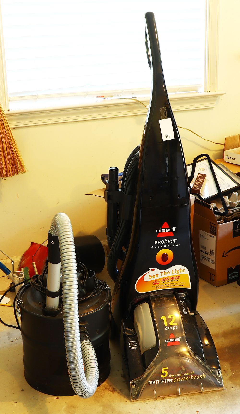Lot 460: Bissell and Red Stone Vacuum cleaners