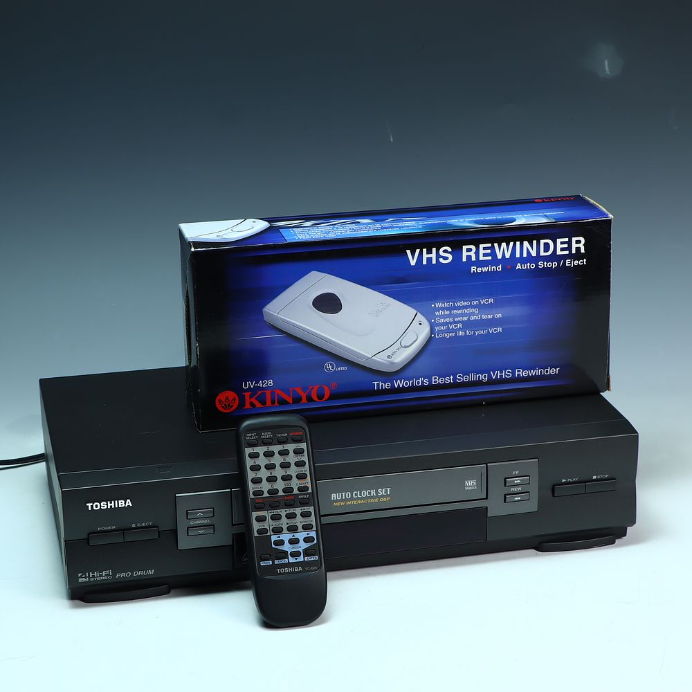 Lot 153: Toshiba Pro Drum VHS player and a Kinyo VHS Rewinder