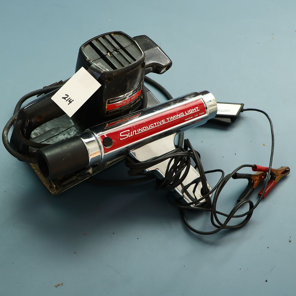 Lot 214: Sun Inductive timing light and a Craftsman sander