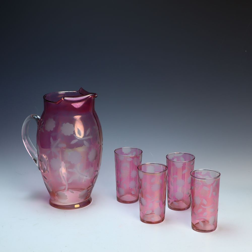 Lot 226: Vintage pink pitcher and four juice glasses