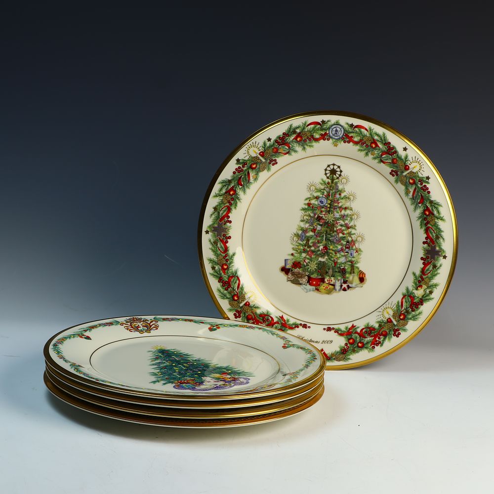 Lot 232: Five Lenox USA plates from the Christmas Trees Around The World Plate
