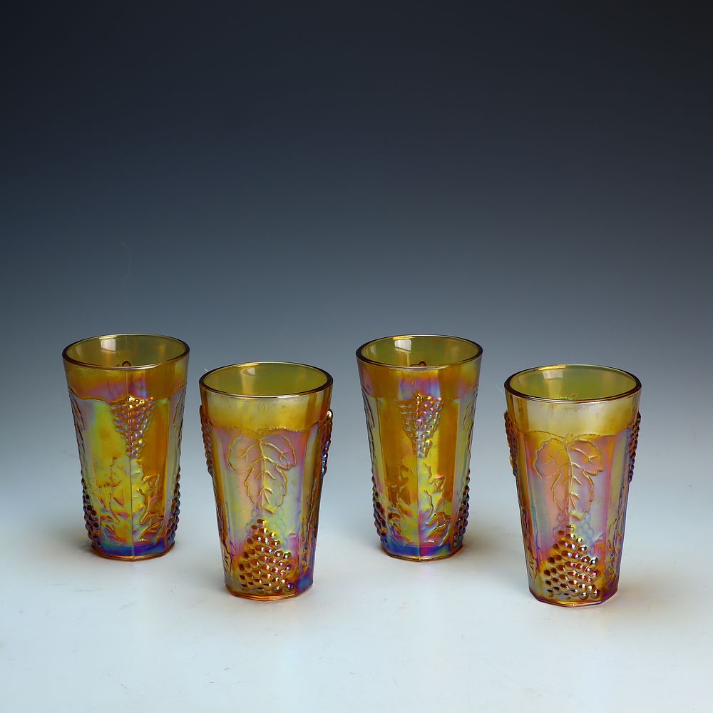 Lot 241: Vintage Carnival glass grape design water glasses