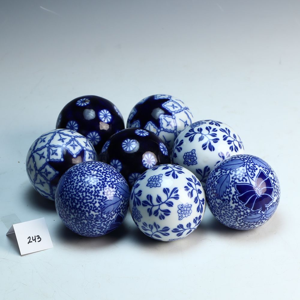 Lot 243: Eight porcelain Oriental decorative balls