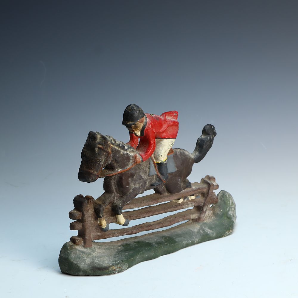 Lot 252: Vintage cast iron horse Jockey doorstop