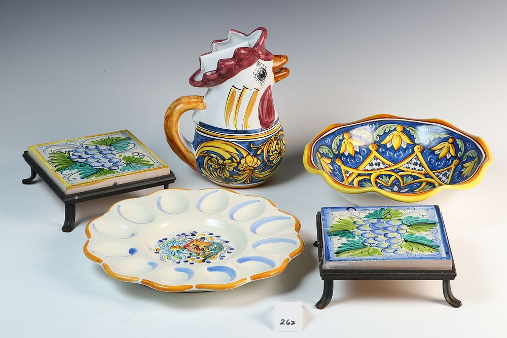 Lot 262: Two Trivets and a Pitcher