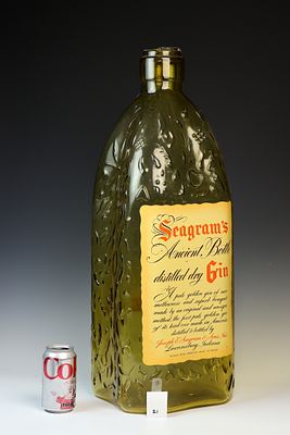 Large Glass Decorative Seagrams Gin Bottle. Natural glass 28.5 inches tall x 9 inches wide