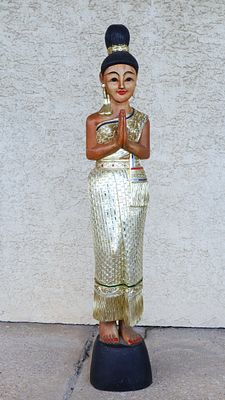 Sawadee wooden Tall statue carving. Sawadee wooden life size statue carving 50 inches tall