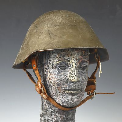 Antique WWI military metal and leather helmet. Antique military metal and leather helmet 10.5X12 
