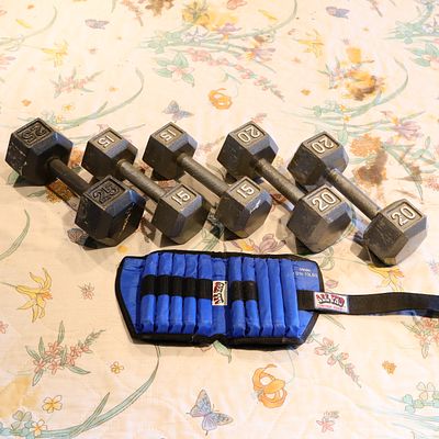 Dumbell and Ankle Cuff Weights. 100 pounds of exercise weights as shownPick up of this lot is