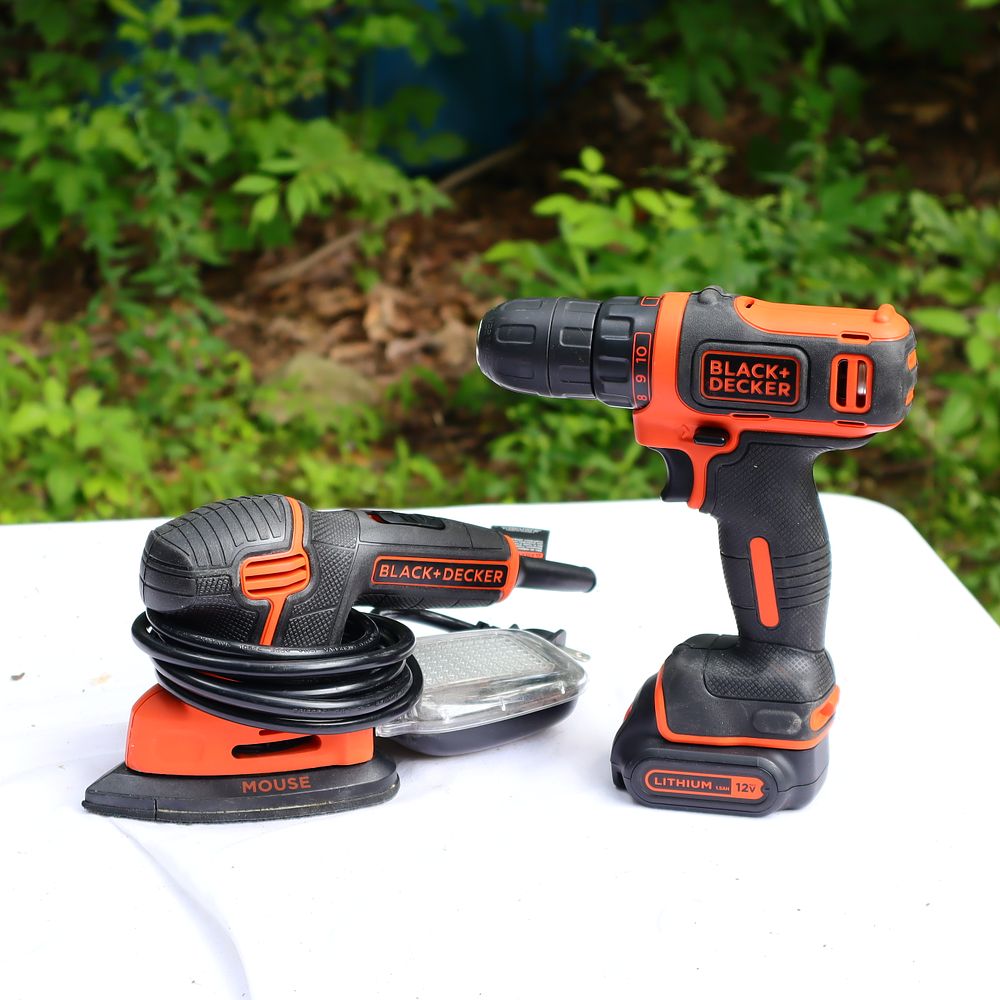 Lot 235: Black and Decker Cordless Drill and Palm Sander