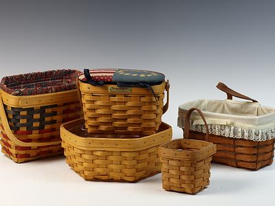 A Collection of Longaberger Woven Wood Baskets and Accessories. A collection of hand-woven wood 