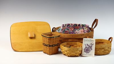 A Collection of Longaberger Woven Wood Baskets and Accessories. A collection of woven wood 