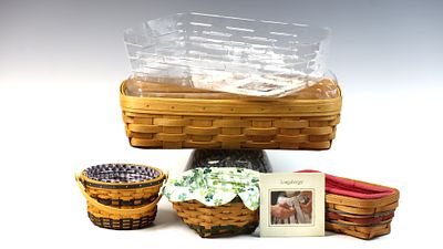 A Collection of Longaberger Handmade Baskets with Fabric Liners and Plastic Protectors. A 