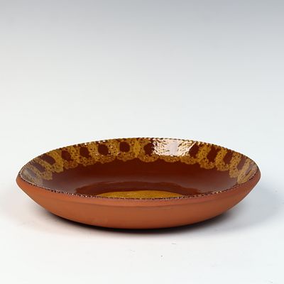 Ned Foltz Foltz Pottery Redware Bowl with Pig Motif. A contemporary American redware earthenware 