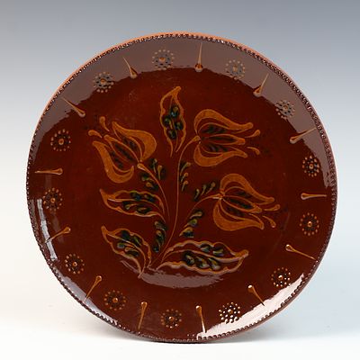 Ned Foltz Redware Pottery Slip-Decorated Tulip Plate, 1987. A large contemporary Pennsylvania 