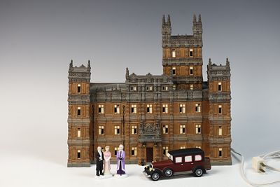Department 56 Downton Abbey Lighted Building with Figurines and Motorcar. A licensed Department 