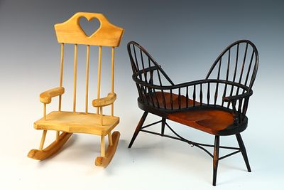 A Pair of Miniature Wood Chairs in the Windsor Style. A pair of miniature wooden chairs designed 
